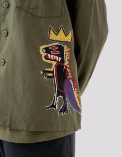 5124 Pez Dispenser Mil Shirt · Maharishi X Jean-Michel Basquiat Olive -Maharishi ss24220 5109 86ec4af5 7cf7 49ca 9618 4b6bbd256806